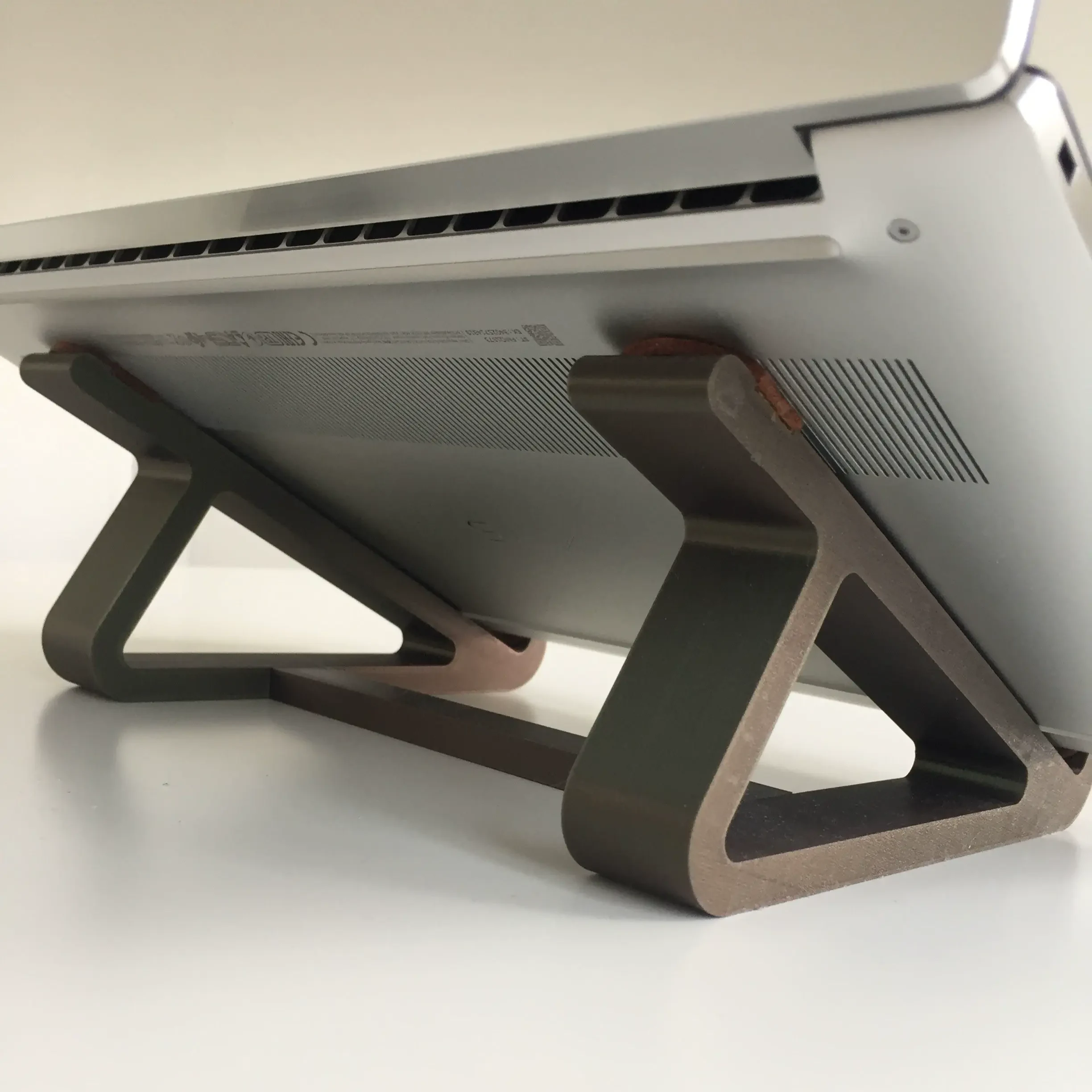 Source preview of the laptop stand 3D model by Deleted Account5884583065