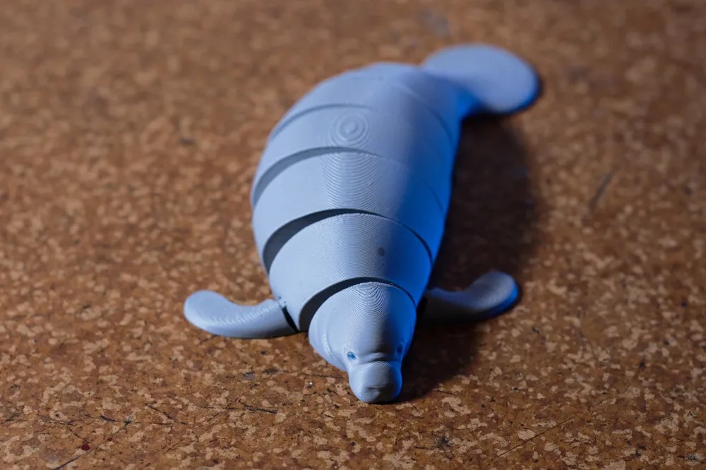 Source preview of the Articulated manatee 3D model by VenomLive