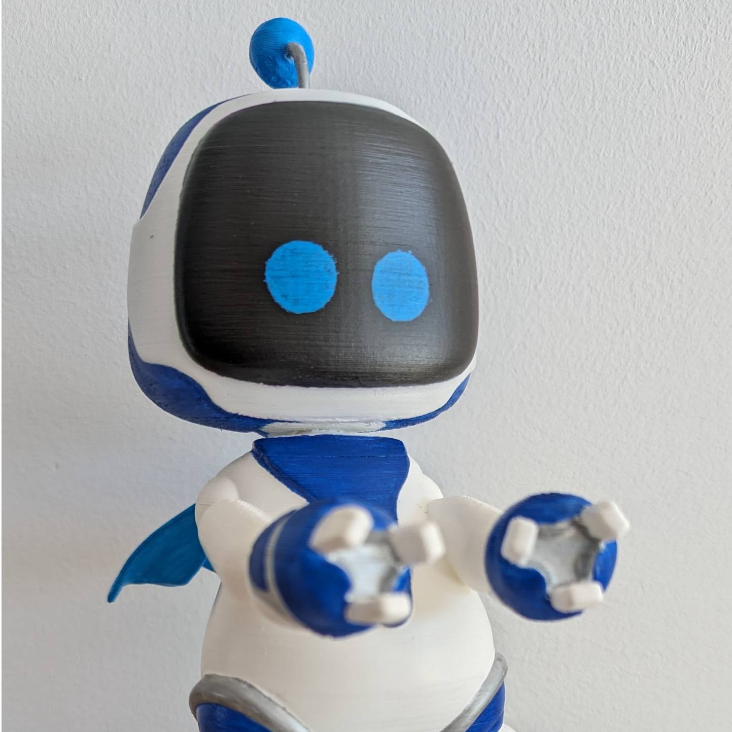 Source preview of the Astro Bot PS5 controller stand 3D model by Pawlik88