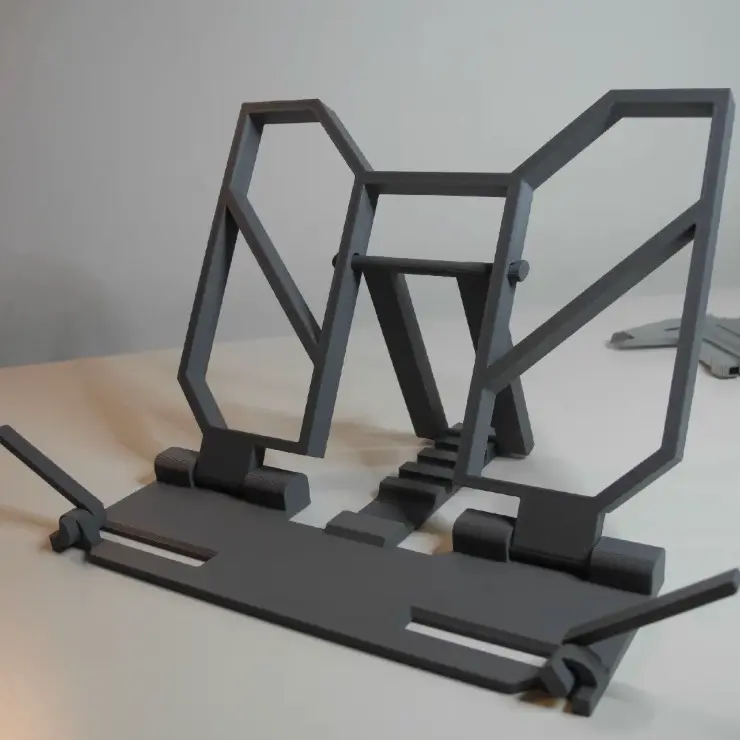 Bronvoorbeeld van het 3D-model Book holder door OMG3dprinting