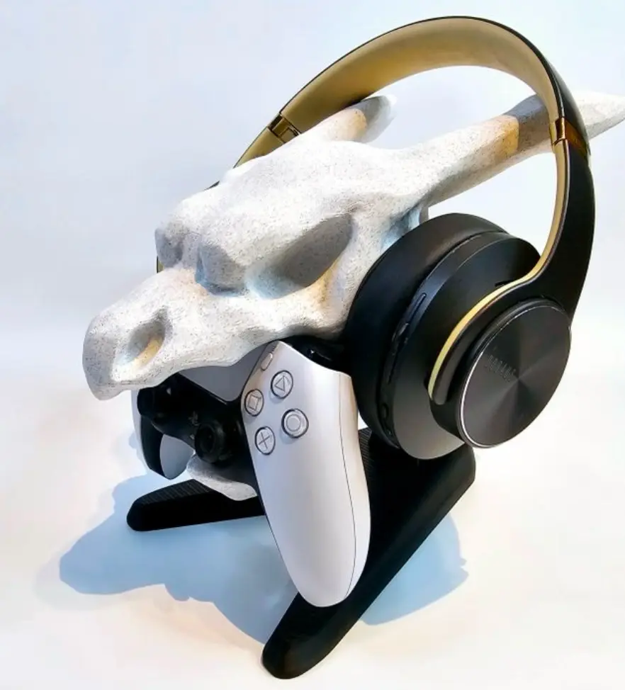 Bronvoorbeeld van het 3D-model Charizard ps5 controller stand door Jacques Posthumus