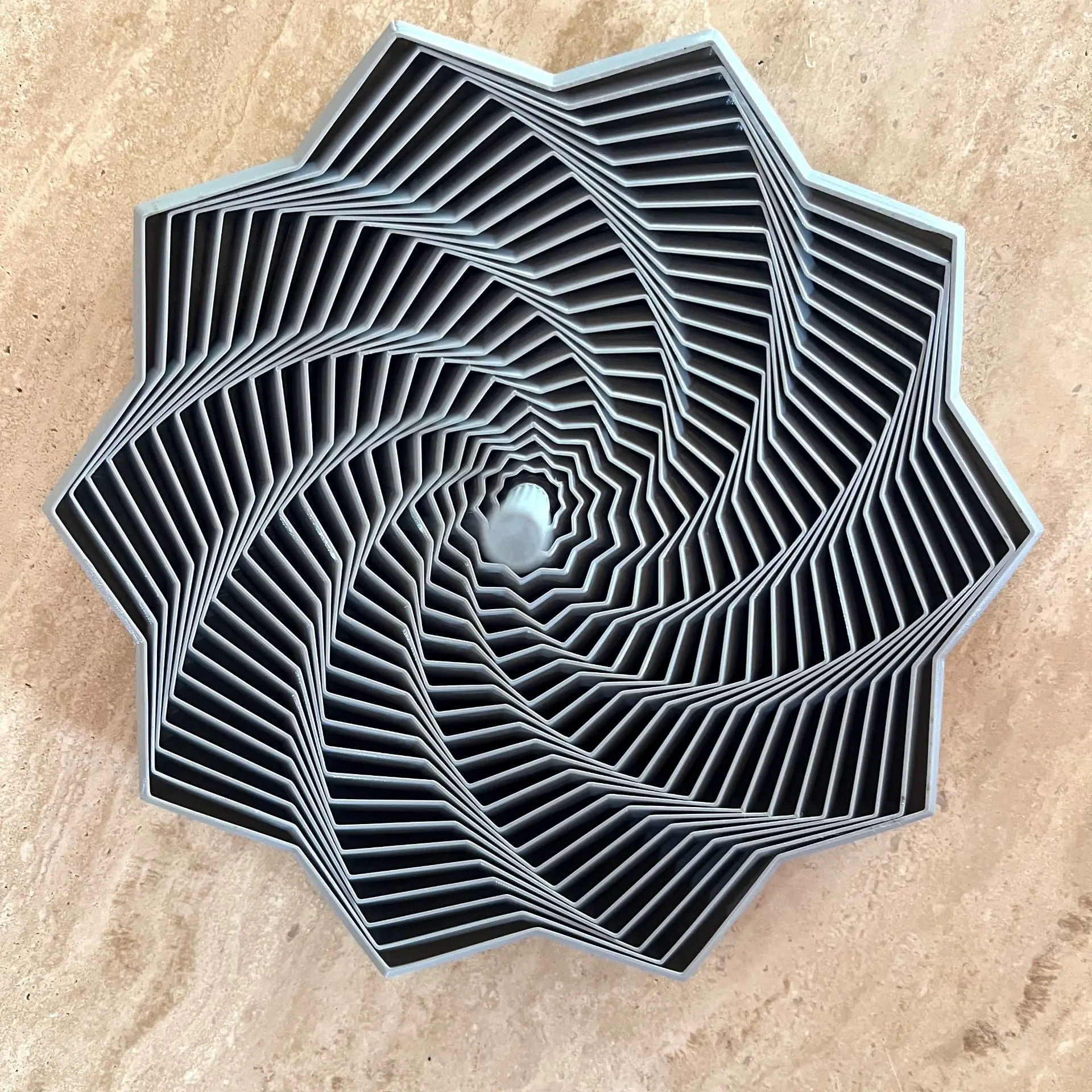 Bronvoorbeeld van het 3D-model fidget star with handle door 3DMaker24