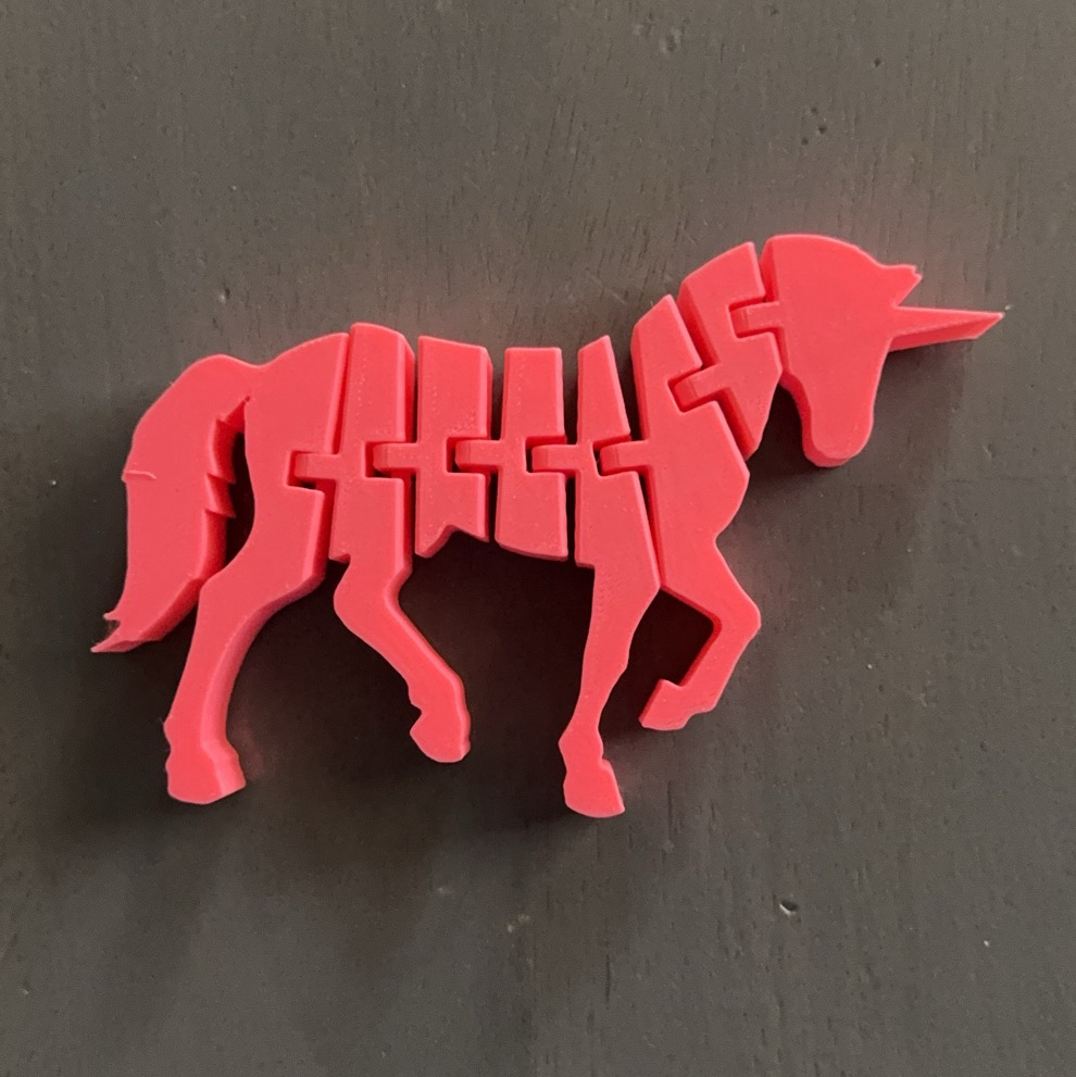Source preview of the flexi unicorn 3D model by TrashyPrinting