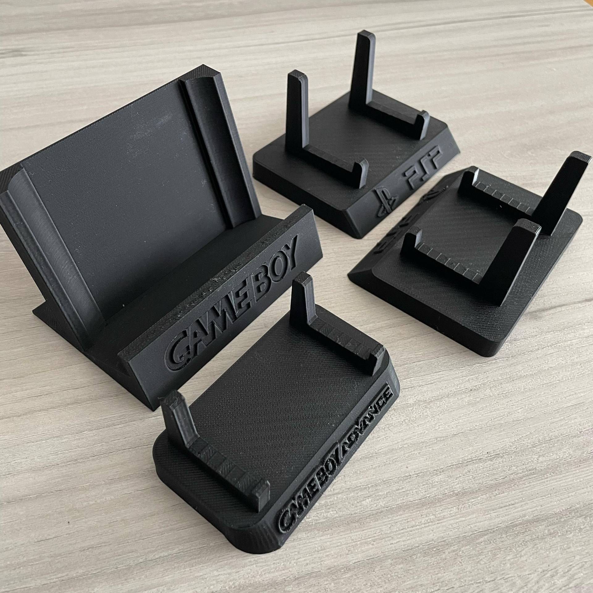 Source preview of the Game Boy, Game Boy Advance and PSP Stands 3D model by NavarGamer