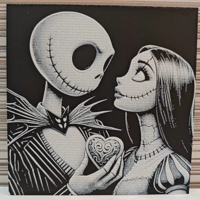 Source preview of the Hueforge Jack and Sally 3D model by Litolunar