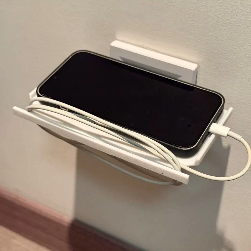 Source preview of the iPhone socket charger holder for iPhone 14 3D model by Serhii Shkurin