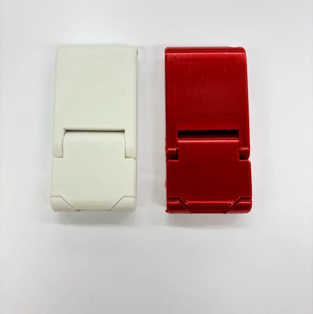 Source preview of the Keyring phone stand 3D model by Theachops 